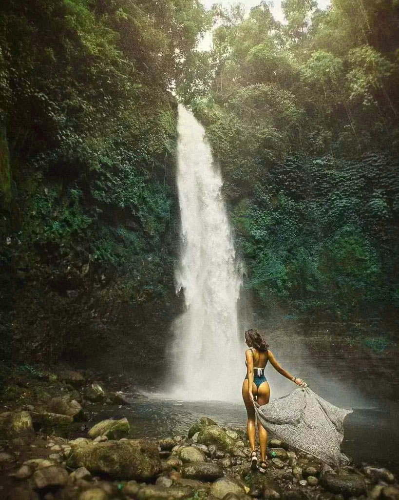 Discover the stunning Nung Nung Waterfall, surrounded by lush jungle